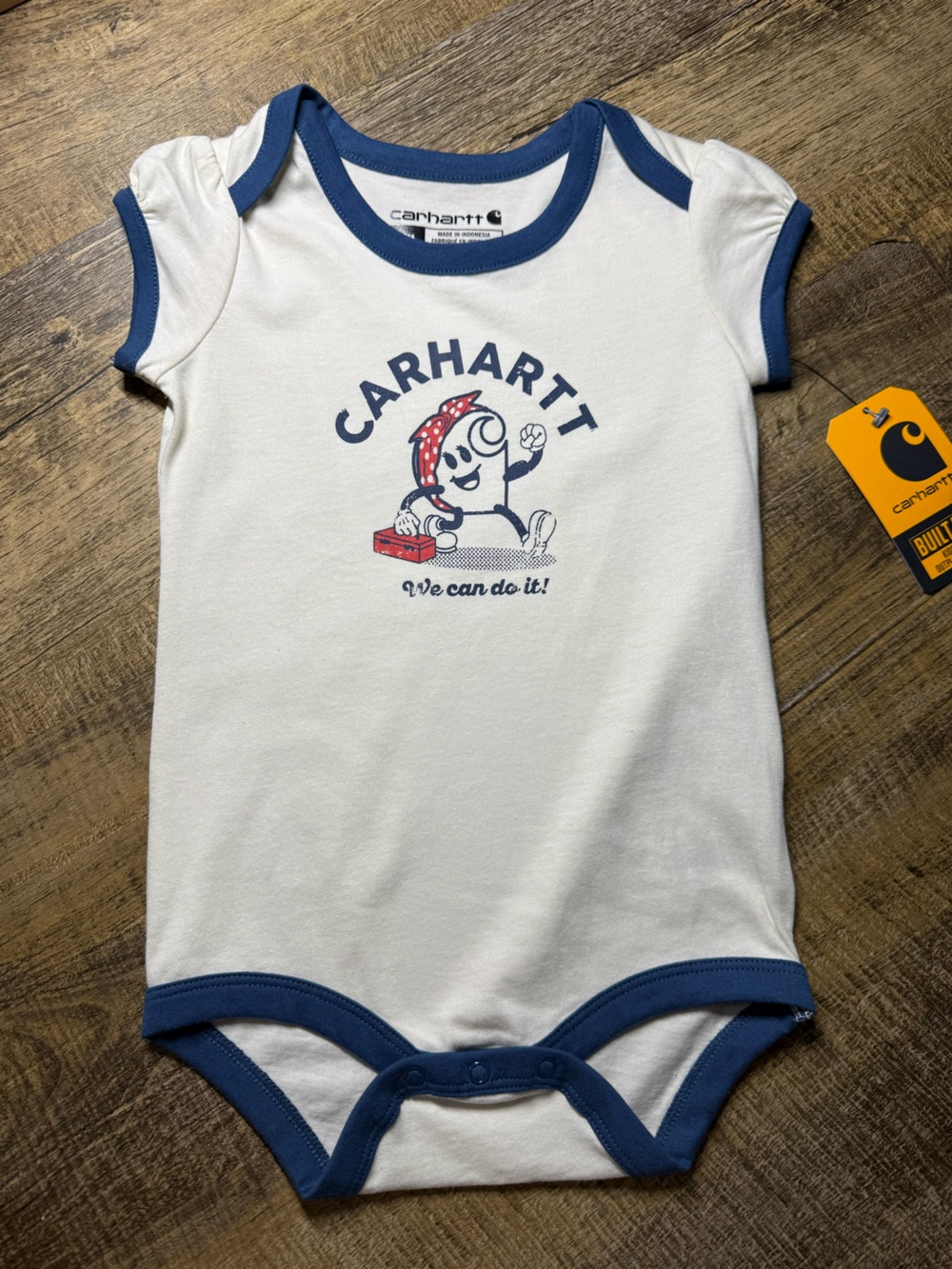 Carhartt Cream Baby Bodysuit with Navy Trim and Retro Graphic